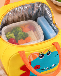 Open lunch bag showing the silver foil lining with a lunch box inside