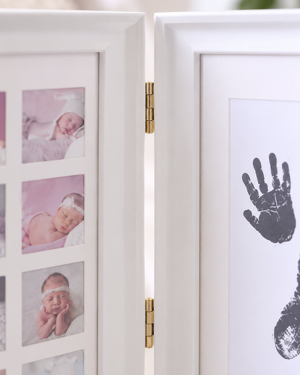 Close-up of the frame's metal hinge and the grid of small monthly photo windows