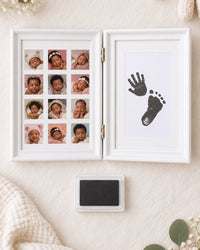 Open frame and black ink pad laid out from above on a linen cloth