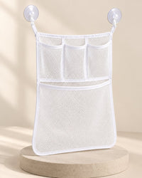 White mesh organiser with three small top pockets and a big bottom pocket, hung on two suction cups