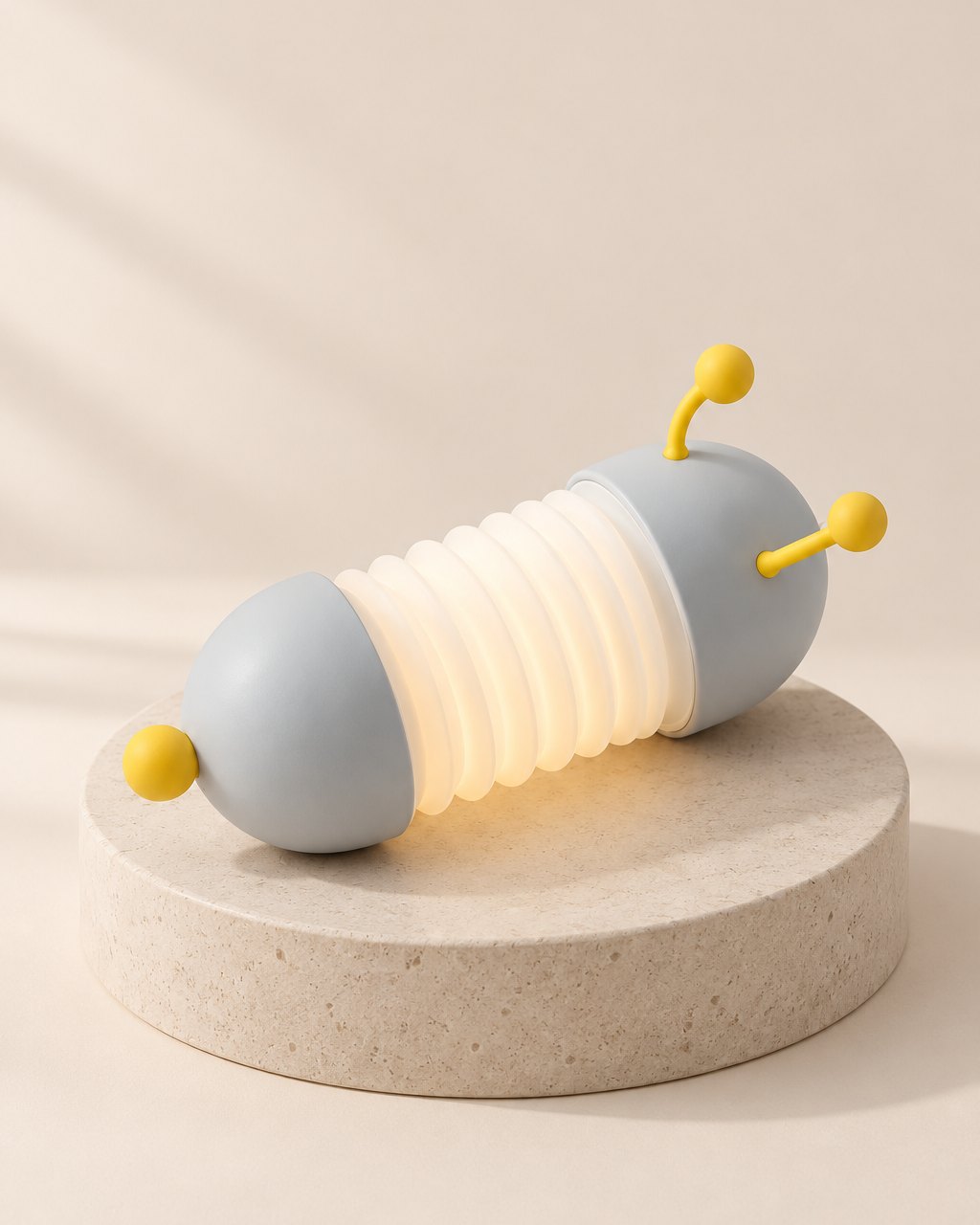 Grey caterpillar night light with yellow antennae