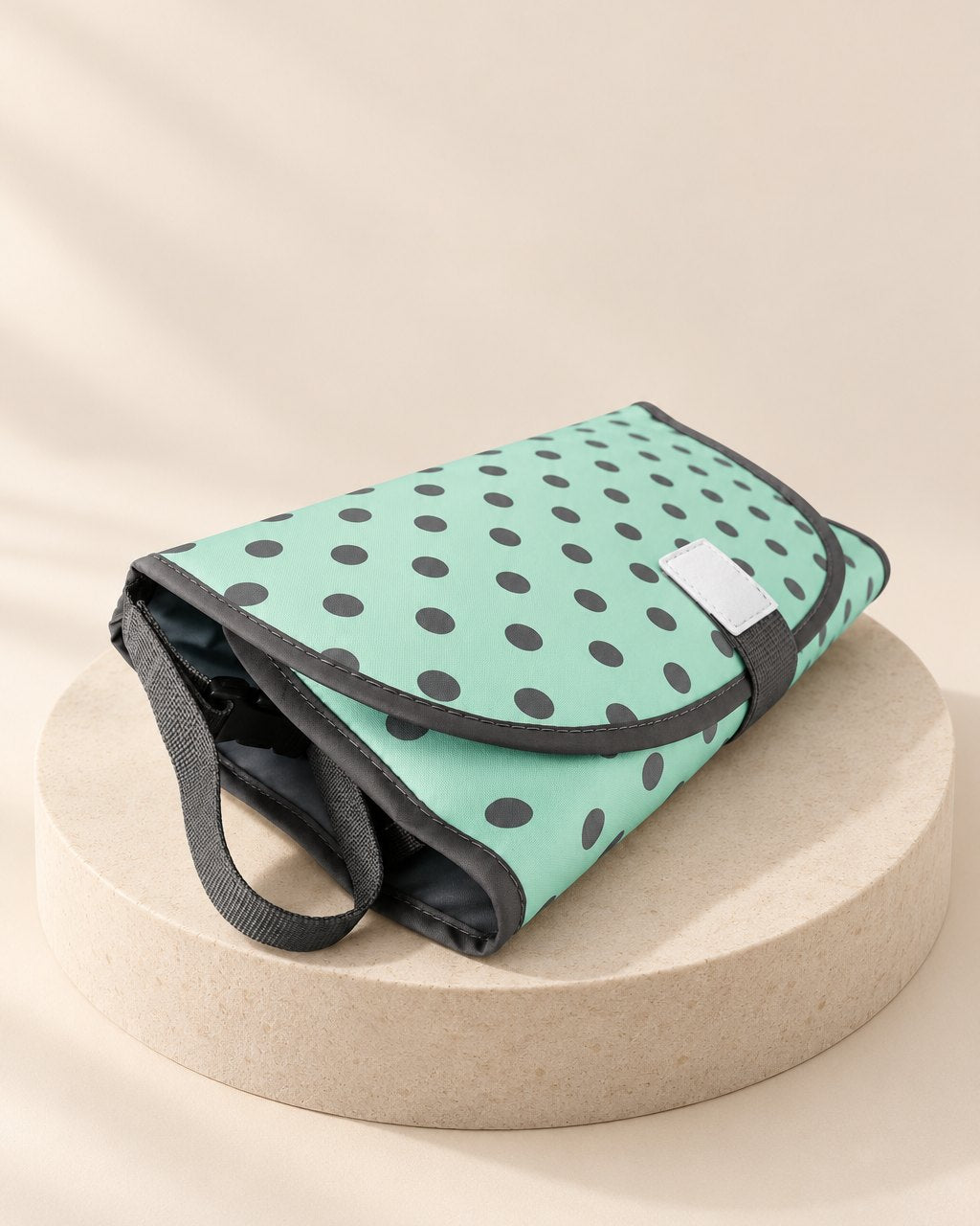 Mint changing clutch with grey polka dots