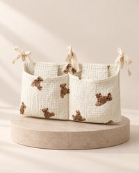 Cream two-pocket hanging organiser with a small brown bear print