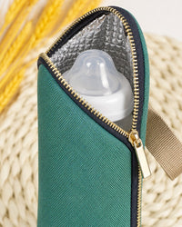 Close-up of the open zip and silver insulated lining