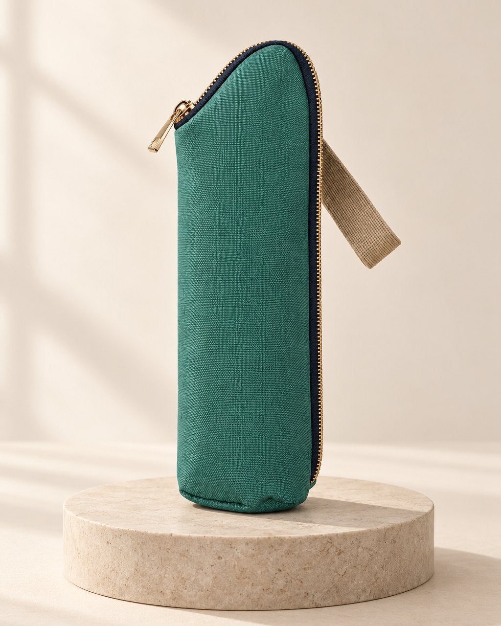 Slim teal-green zip-top insulated bottle bag standing upright