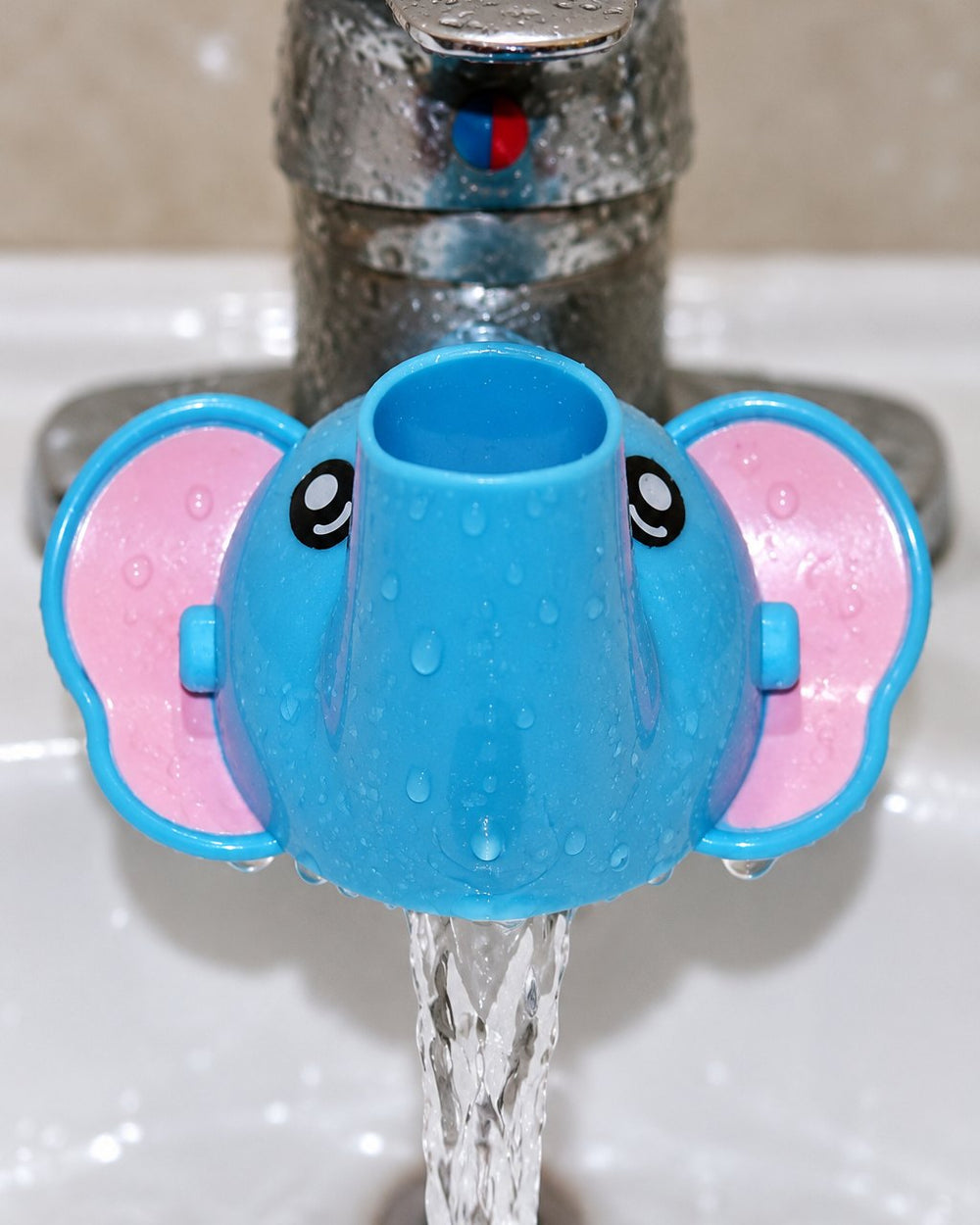 Close-up of the soft back of the extender stretched over a tap