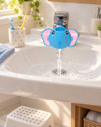 Bright family bathroom sink with the elephant spout and a small step stool