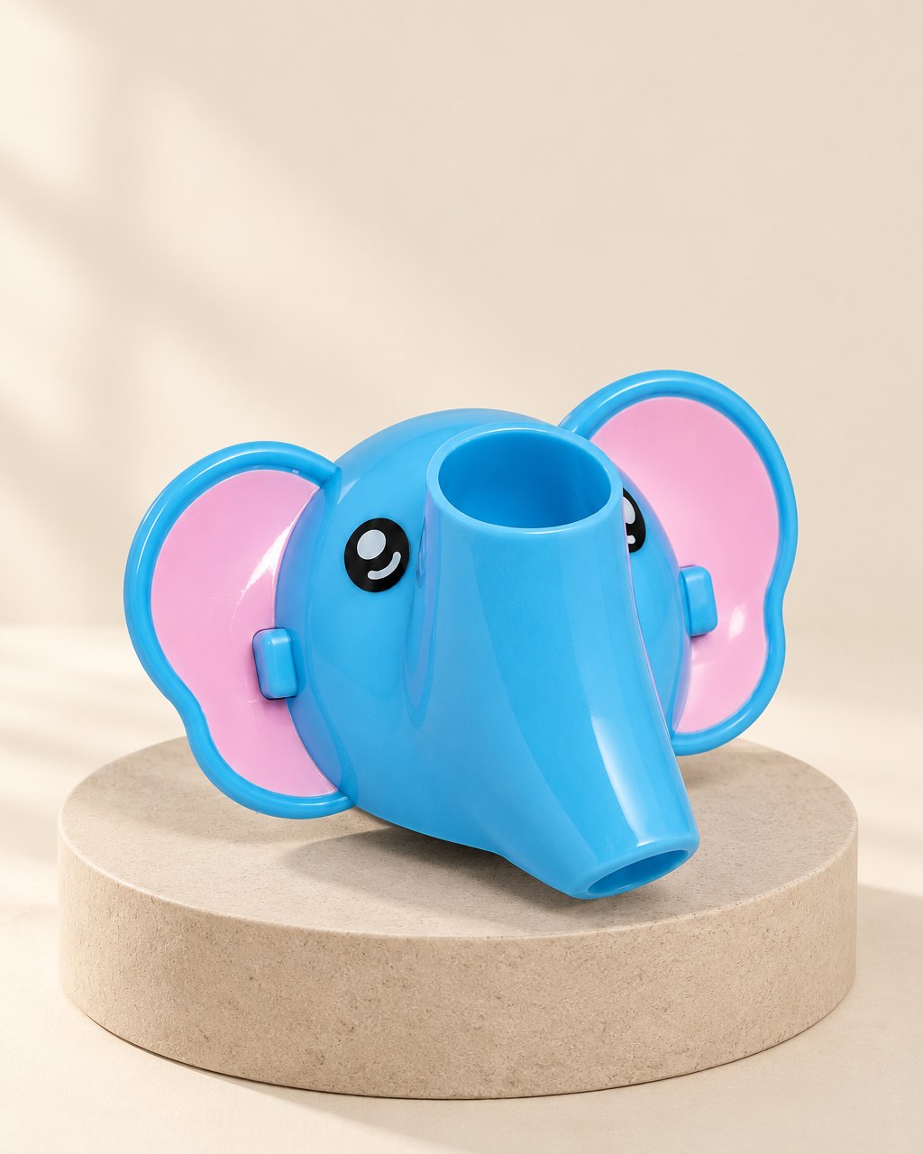 Blue elephant faucet extender with pink ears
