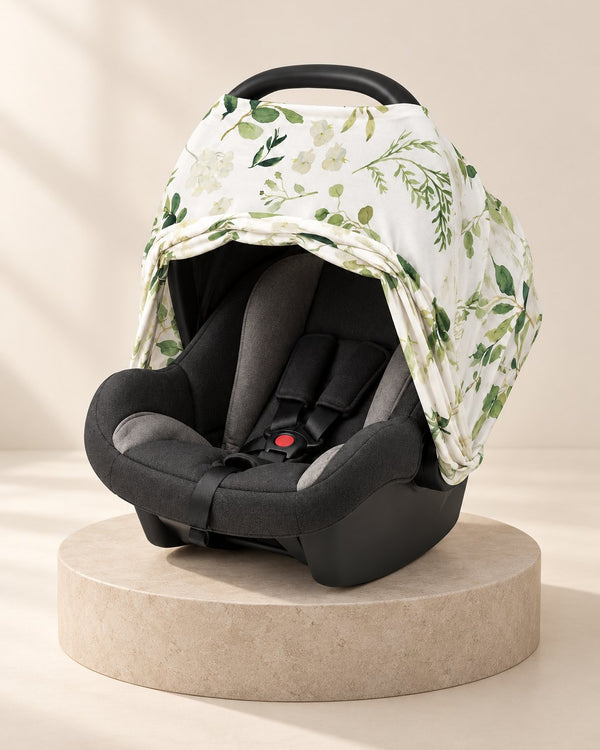 Infant car seat with the stretch cover over the canopy and the front folded back open
