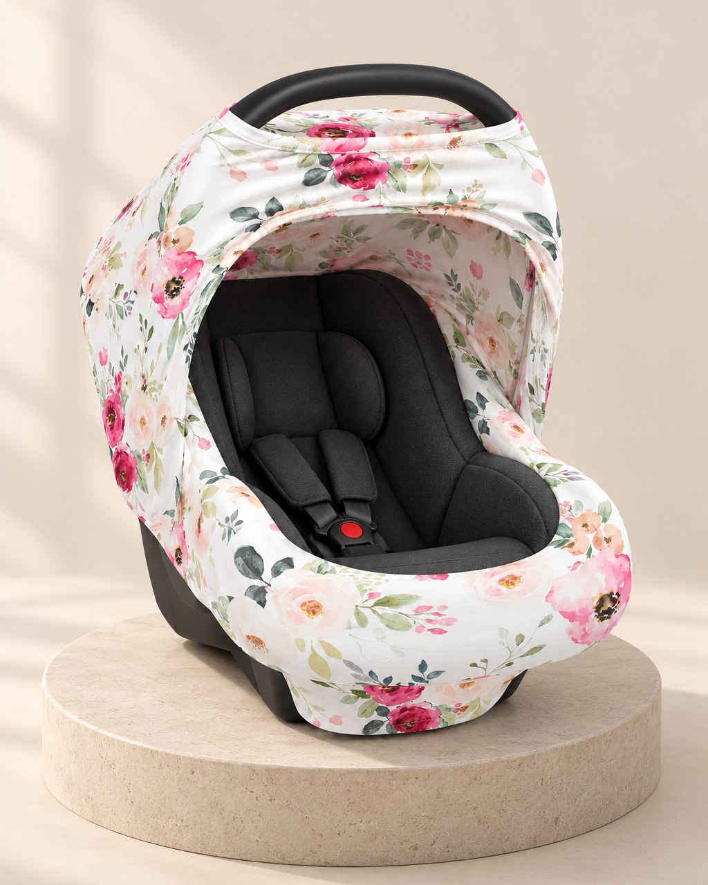 Car seat cover in a white print with pink and red roses, over the canopy with the front open