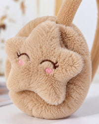 Close-up of the stitched sleepy-eyed star on the fluffy ear cup