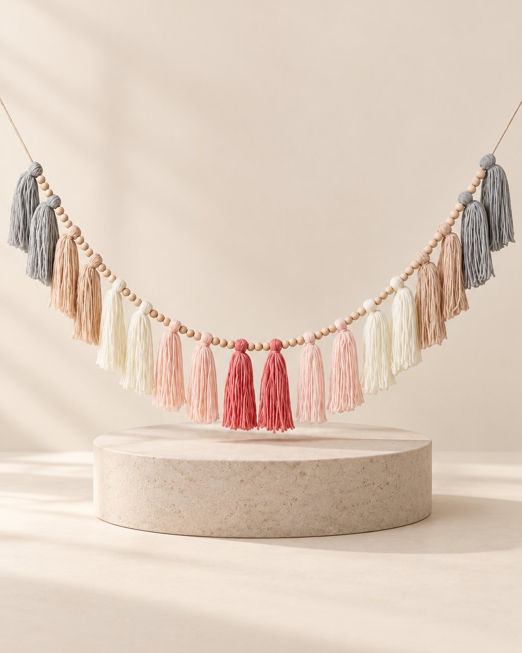 Blush pink and grey tassel garland with wooden beads
